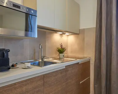 Cucina o angolo cottura di Suites Cavour 34 by 360Rentals