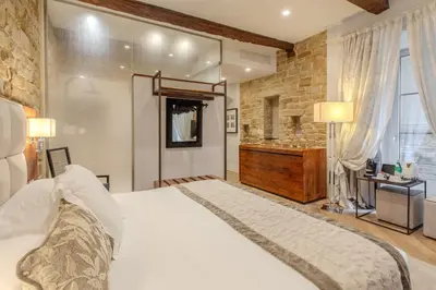 Letto o letti in una camera di Donati Luxury Tower Suites