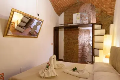 Letto o letti in una camera di Secret Suite: a dream came true in Florence