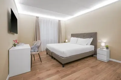 Letto o letti in una camera di B&B Le Stanze del Duomo