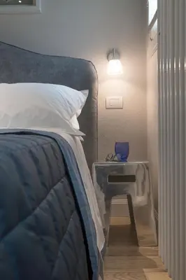 Letto o letti in una camera di Pergola35