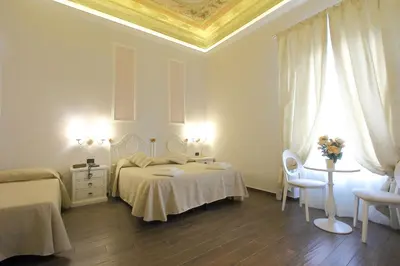 Letto o letti in una camera di Hotel Ferrucci