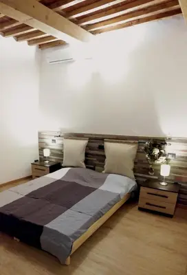 Letto o letti in una camera di Giulia in S.Reparata
