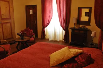 Letto o letti in una camera di Villa Il Leccio