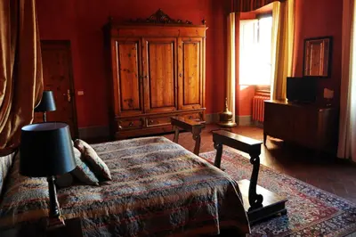 Letto o letti in una camera di Villa Il Leccio