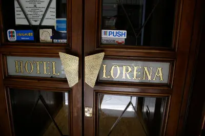 Certificato, attestato, insegna o altro documento esposto da Hotel Lorena