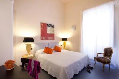 Letto o letti in una camera di Palazzo Lombardo