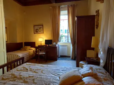 Letto o letti in una camera di Hotel Tourist House