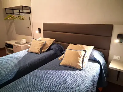 Letto o letti in una camera di Hotel Tourist House