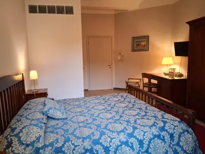 Letto o letti in una camera di Hotel Tourist House