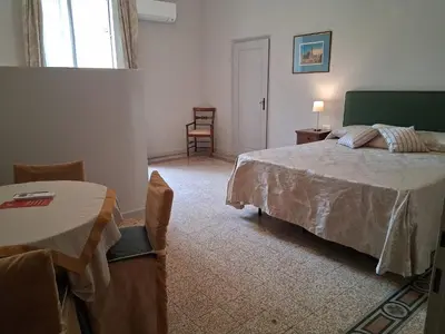 Letto o letti in una camera di Hotel Tourist House