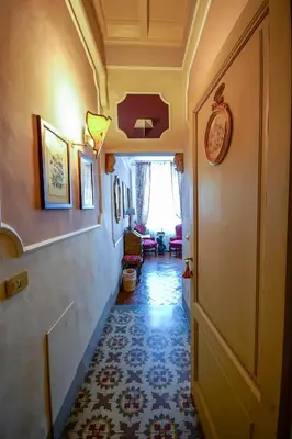 Letto o letti in una camera di Relais & Maison Grand Tour