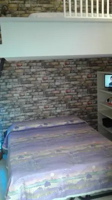 Letto o letti in una camera di Terrazza Giraldi