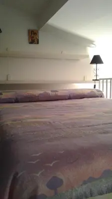 Letto o letti in una camera di Terrazza Giraldi