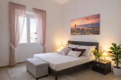 Letto o letti in una camera di Emma & Olga Apartments -In the city Centre-