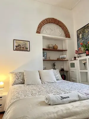 Letto o letti in una camera di Home Milù - Milù Holidays Firenze