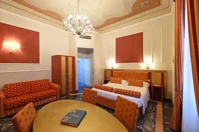 Letto o letti in una camera di Relais La Corte di Cloris