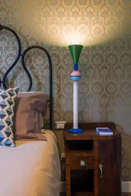 Letto o letti in una camera di Frími Boutique Rooms b&b