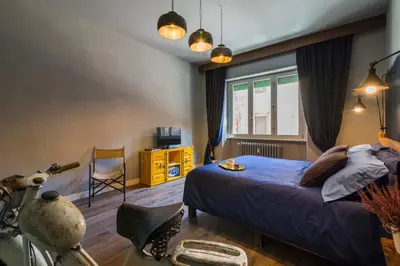 Letto o letti in una camera di Frími Boutique Rooms b&b