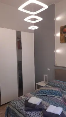 Letto o letti in una camera di La Firenze Sogna