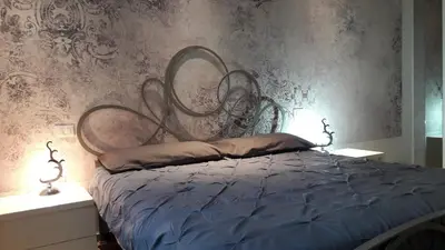 Letto o letti in una camera di La Firenze Sogna