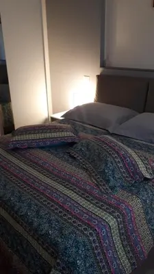 Letto o letti in una camera di La Firenze Sogna