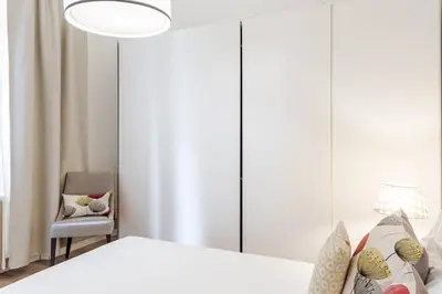 Letto o letti in una camera di Cottage in centro con parcheggio privato