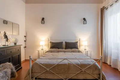 Letto o letti in una camera di Dante Experience Apartment