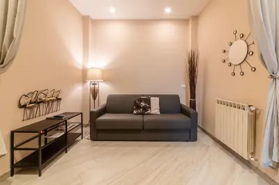 Area soggiorno di Dante Experience Apartment