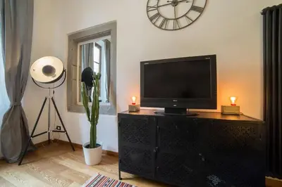 TV o dispositivi per l'intrattenimento presso Step to Duomo and All the Sights from Refurbished Apartment