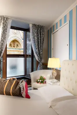 Letto o letti in una camera di Il Terrazzino sulla Cattedrale