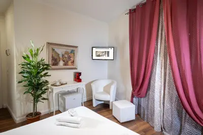Letto o letti in una camera di Il Terrazzino sulla Cattedrale
