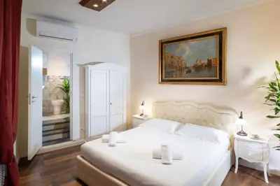 Letto o letti in una camera di Il Terrazzino sulla Cattedrale