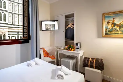 Letto o letti in una camera di Il Terrazzino sulla Cattedrale