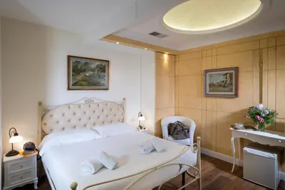 Letto o letti in una camera di Il Terrazzino sulla Cattedrale