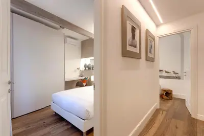 Letto o letti in una camera di Parione Roof Terrace by Mamo Florence