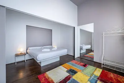 Letto o letti in una camera di Roommo Fortezza