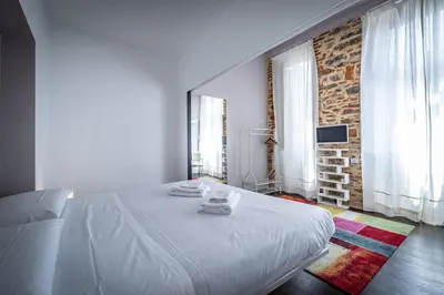 Letto o letti in una camera di Roommo Fortezza