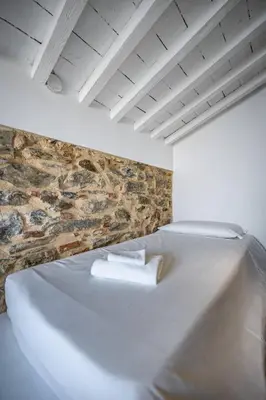 Letto o letti in una camera di Roommo Fortezza