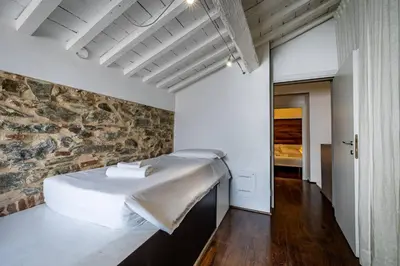 Letto o letti in una camera di Roommo Fortezza