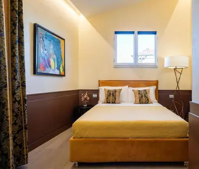 Letto o letti in una camera di Duomo Suites Florence