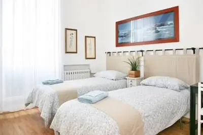 Letto o letti in una camera di Il Podesta