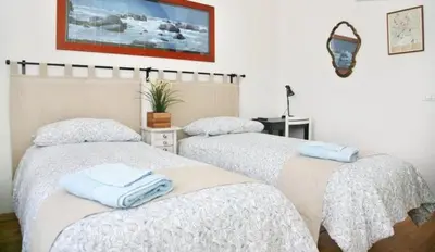 Letto o letti in una camera di Il Podesta