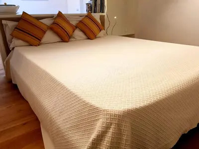 Letto o letti in una camera di Loft Bianco