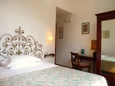 Letto o letti in una camera di Classic Hotel