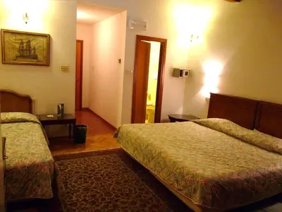 Letto o letti in una camera di Classic Hotel