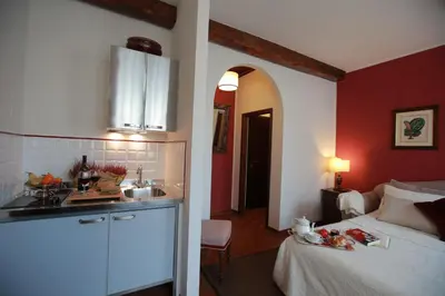 Letto o letti in una camera di S. Spirito Studio Flat