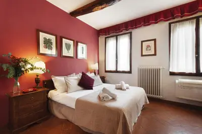 Letto o letti in una camera di S. Spirito Studio Flat