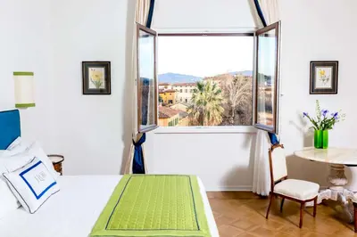 Letto o letti in una camera di Flor in Florence