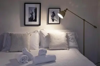 Letto o letti in una camera di Great Location Just Infront of Pitti Palace